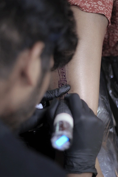 Artist making Tattoo