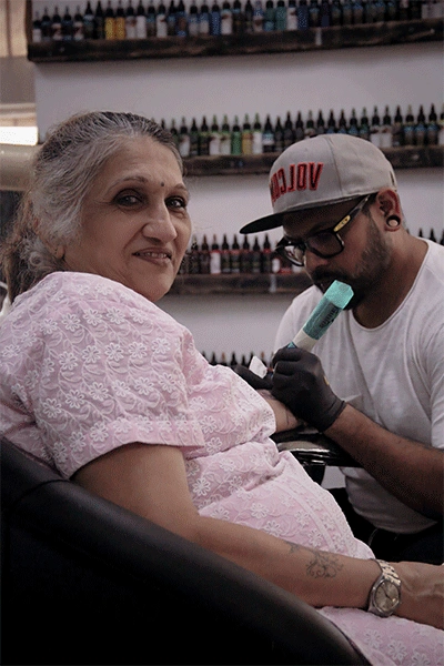 Aunty Making Tattoo on Her Hands