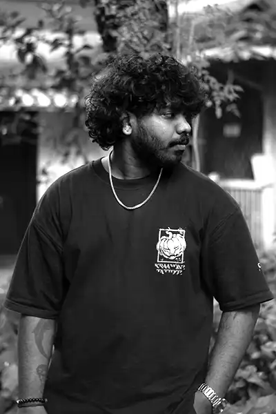 Portrait of tattoo artist Anujeet at KRAAYONZ Tattoo Studio.
